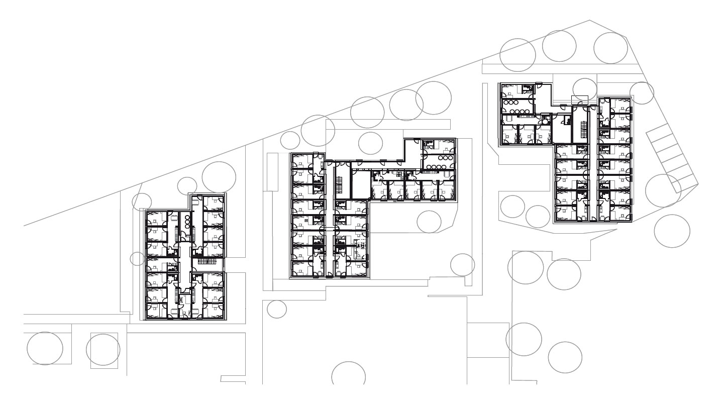 Situačný plán študentských internátov Heidelberg. Tri stavebné objekty s jedno-, dvoj- a trojizbovými  apartmánmi pre 265 študentov. Vonkajší priestor zahŕňa parkovisko, zastrešené stojany na bicykle,  kútik na grilovanie a centrálnu práčovňu.