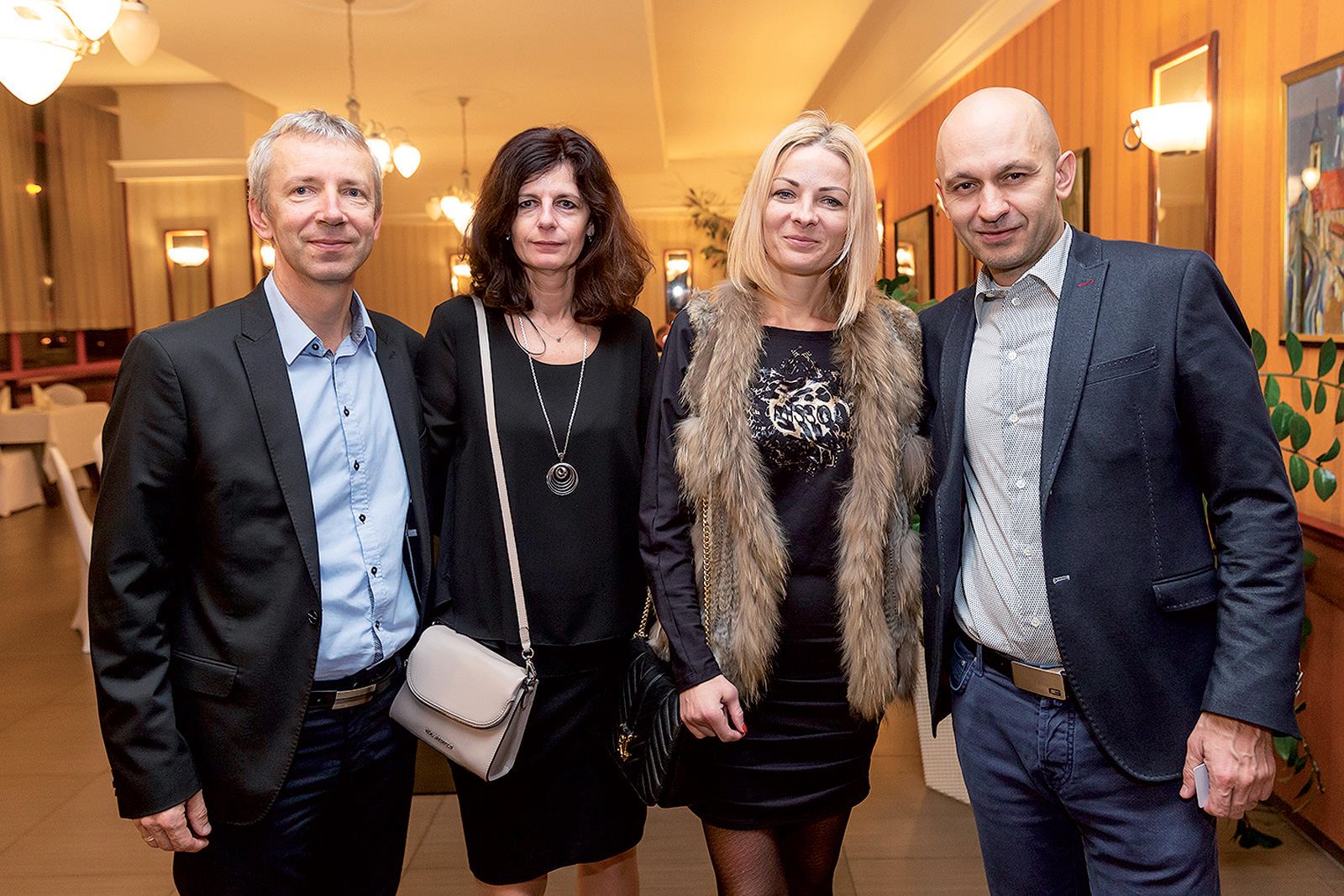 Zľava: Norbert Muller a Radoslav Kmec, GU Slovensko s manželkami