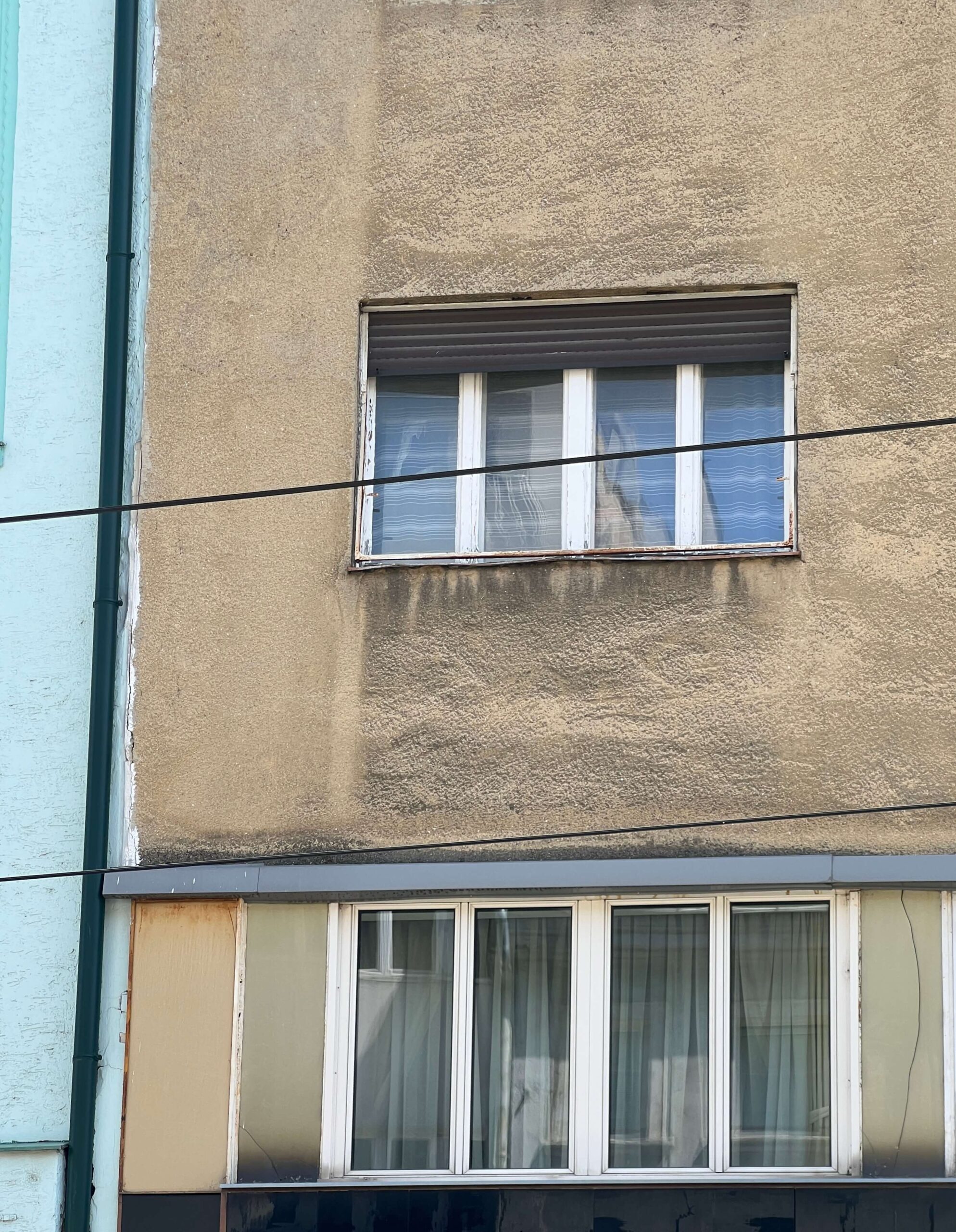 Fasáda bytového domu na Obchodnej 10