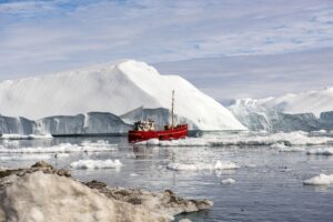 Ľad z topiacich sa grónskych ľadovcov v exkluzívnych baroch v Dubaji? Žiaden problém, na emisie zabudnite