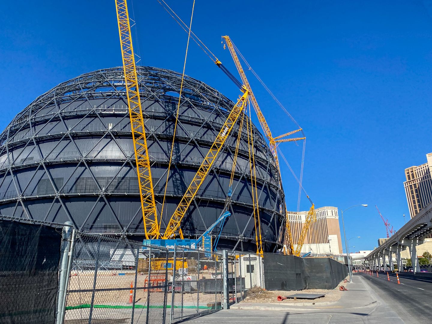 The Sphere while under construction nestled behind the Las Vegas Strip