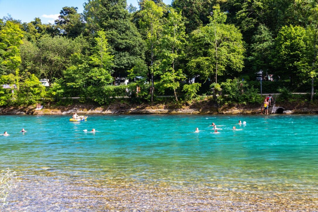People swimming in the Aare river in Bern, Switzerland