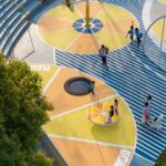 Zo zanedbanej oblasti spravili mestský park plný farieb. Kruhovú tribúnu obsypali pomarančmi