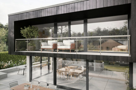 Moderný rodinný dom s dvojpodlažným presklením z kompozitných okien