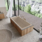 Moderná vaňa do kúpeľne pri presklenej stene s výhľadom na prírodu